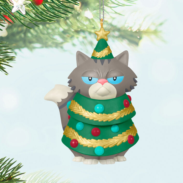 Gray-and-white tabby cat Christmas tree ornament with grumpy face, wearing festive garland and gold star

