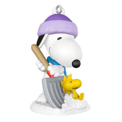 Mini Snoopy ornament in purple hat and scarf shoveling snow, Woodstock riding on shovel, Hallmark Peanuts Christmas collectible