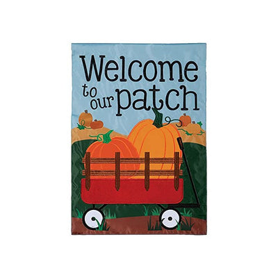 Vertical garden flag with fall design. Red wagon with orange pumpkins. Fall leaves. Text: Welcome to Our Patch