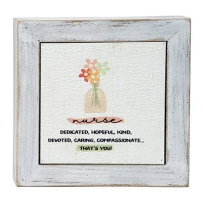 Rustic wood box sign with rainbow motif and the sentiment “Nurse, you’re a blessing in my life,” designed by Barb Lloyd.

