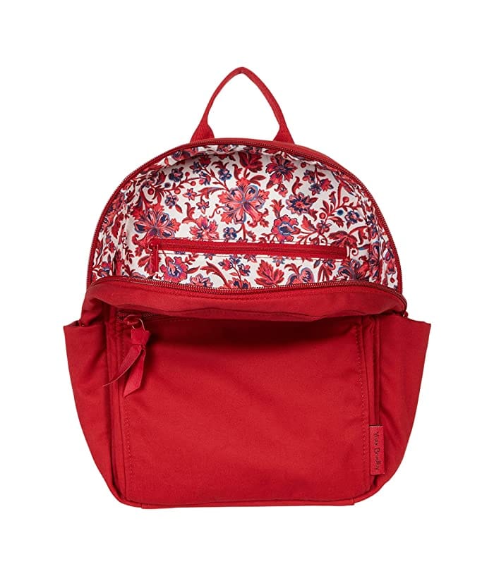 Small backpack in Cardinal Red recycled cotton with multiple zip and slip pockets, 9L capacity
