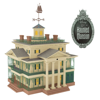 Disney Haunted Mansion tree topper with synchronized light and sound show, remote control activation, and glowing Disney