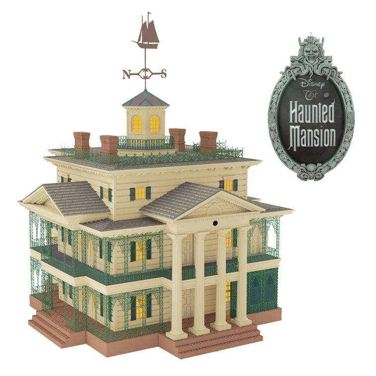 Disney Haunted Mansion tree topper with synchronized light and sound show, remote control activation, and glowing Disney
