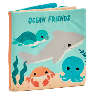 Ocean-themed baby fabric book with sea creature illustrations and tactile features like crinkle paper, squeaker