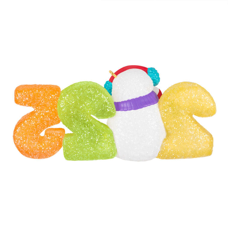 Hallmark Keepsake Sweet Decade 2025 ornament—snowman in purple scarf and blue earmuffs with candy cane, surrounded by glittery gumdrop “2025” numbers