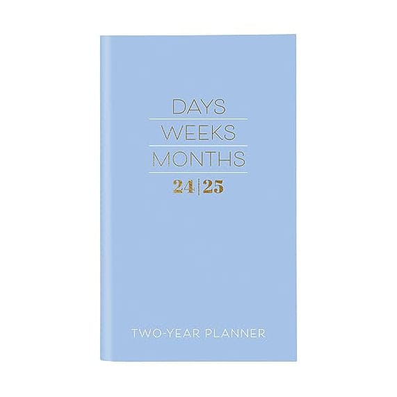 Typographic 2-year pocket planner with flexible cover, daily grids, and gold foil detail for stylish, on-the-go organization.

