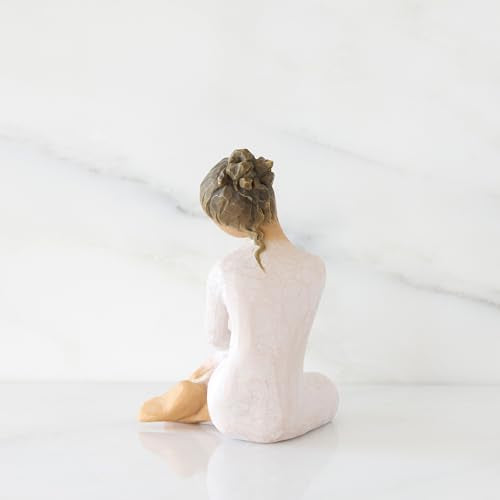 Willow Tree Serenity figurine, seated woman in cream dress with arms crossed in a calm, reflective pose.