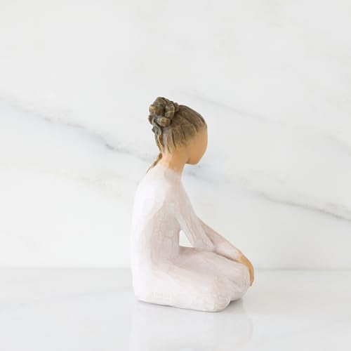 Willow Tree Serenity figurine, seated woman in cream dress with arms crossed in a calm, reflective pose.