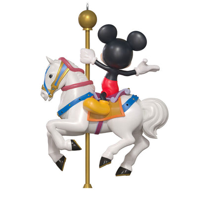 Hallmark Keepsake Disneyland King Arthur Carrousel ornament featuring Mickey Mouse riding a white carousel horse with gold pole, colorful saddle.