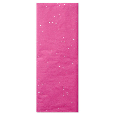 Hot pink Hallmark tissue paper with shimmering iridescent dots, displayed folded and fluffed in a gift bag.