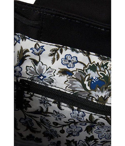 Black mini backpack with buckle flap, drawstring closure, and recycled cotton fabric