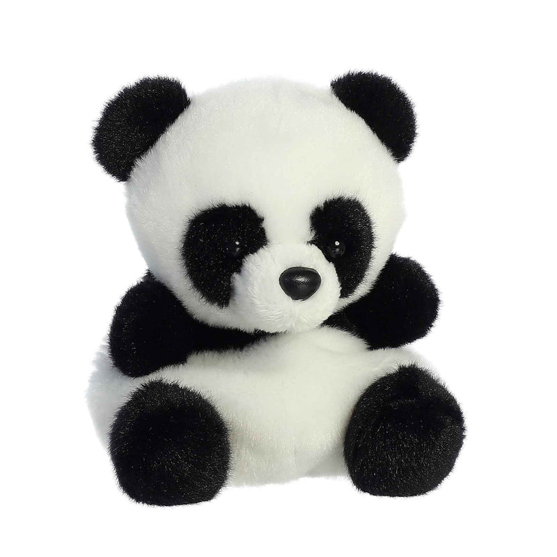 Black and white plush panda bear sitting on a white background