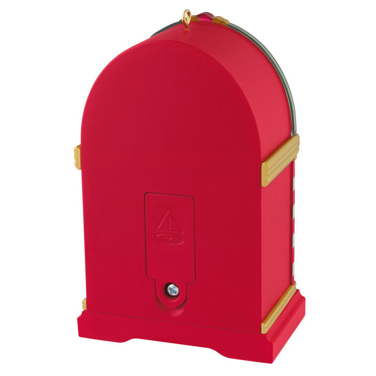 Retro jukebox Christmas ornament with lights and sound, plays three classic holiday tunes, battery operated

