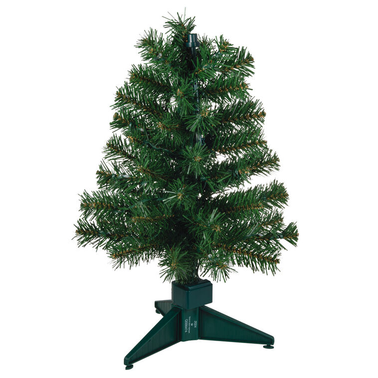 17-inch pre-lit green tabletop Christmas tree with white lights, part of ShowToppers system for sound and light synchronization.