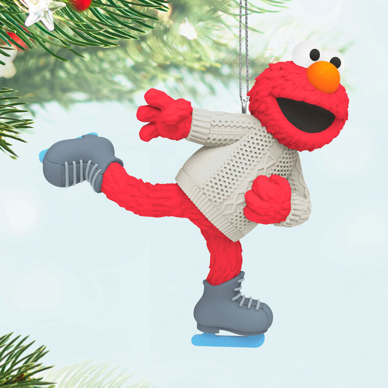 Elmo from Sesame Street ice-skating in a white cable-knit sweater, Hallmark Keepsake ornament, Christmas tree decoration for kids and fans.