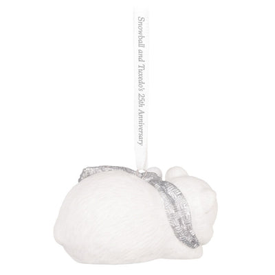 Hallmark Keepsake ornament of Snowball the polar bear cuddling Tuxedo the penguin, white and silver design celebrating 25th anniversary.