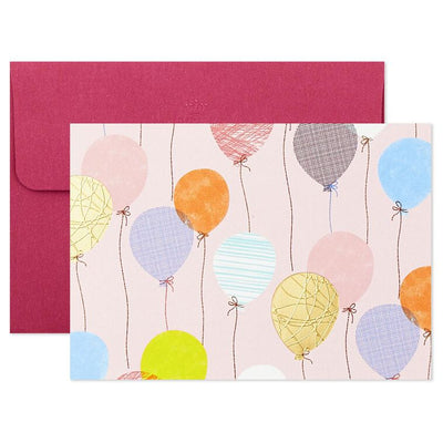 Assorted whimsical note cards with gold foil accents in multiple designs, includes envelopes and reusable caddy.