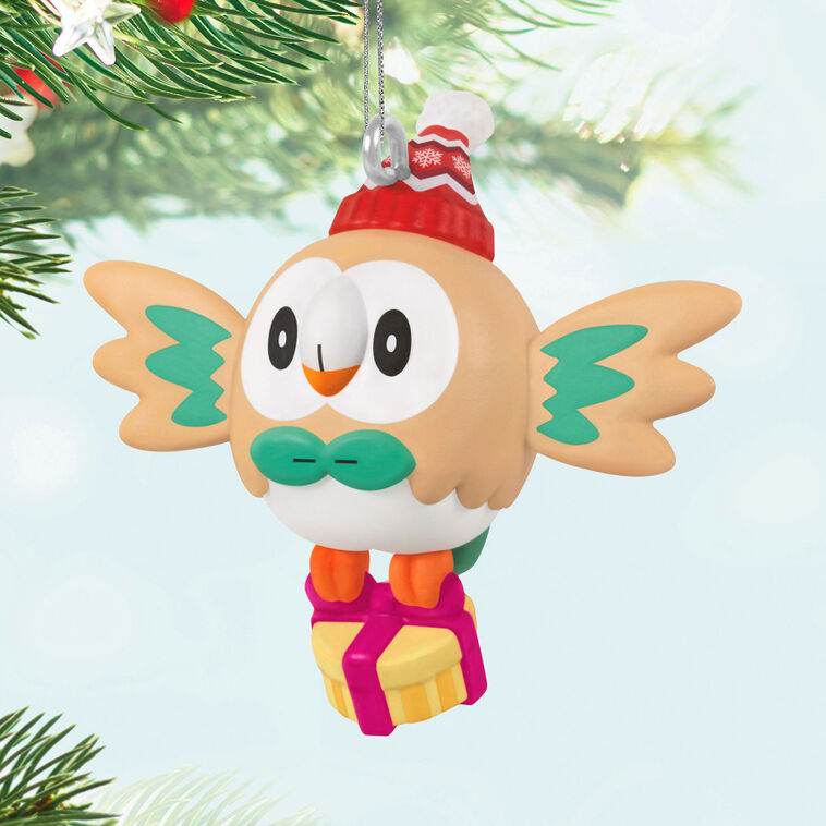 Mini Rowlet ornament, beige owl with green bow tie, red winter hat, and yellow gift box, Hallmark Keepsake Pokémon Christmas collectible

