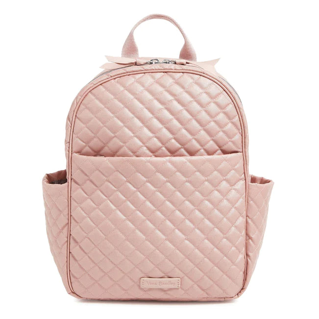 Rose Quartz Vera Bradley small backpack with two slip pockets, zip pockets, zip closure, and adjustable straps