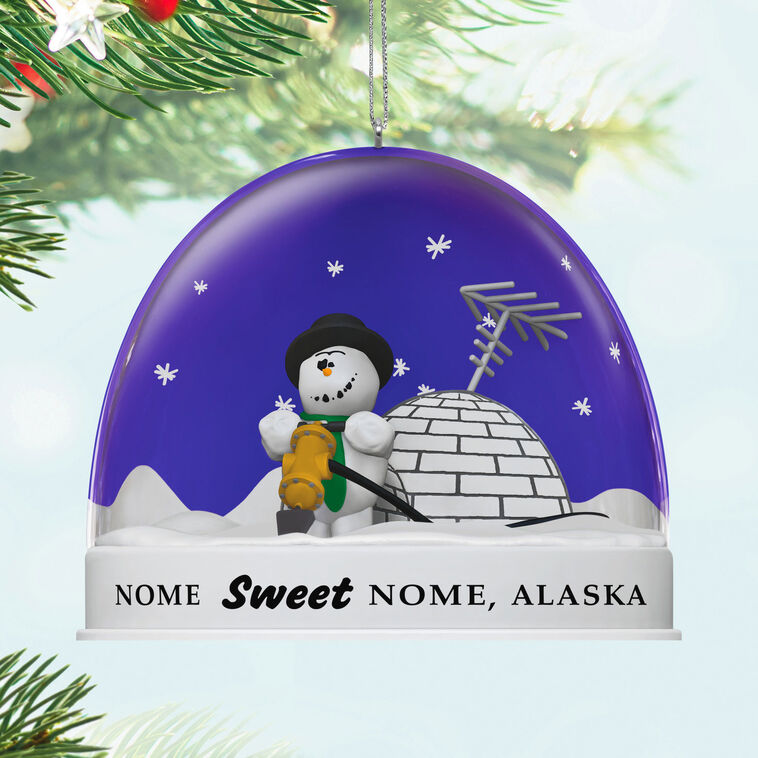 Hallmark Keepsake Knick Knack Snow Globe Escape Plan ornament with snowman inside snow globe labeled Nome, Alaska, Disney/Pixar Christmas decoration.