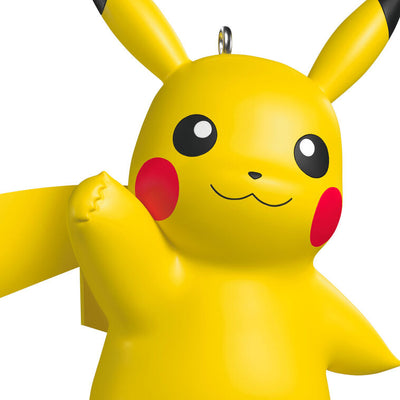 Hallmark Keepsake Pokémon Pikachu Christmas ornament featuring a cheerful, waving Pikachu with red cheeks and bright eyes.