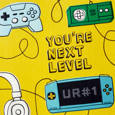 Fun Hallmark blank note cards with video game controllers and cords on a bright yellow background, boxed set of 10 with envelopes.
