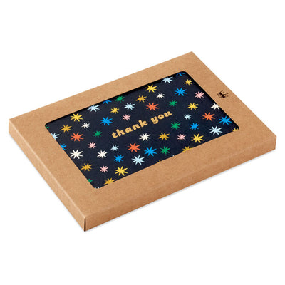 Black thank you cards with multicolor stars and gold foil lettering, shown in a kraft box with white envelopes, pack of 10
