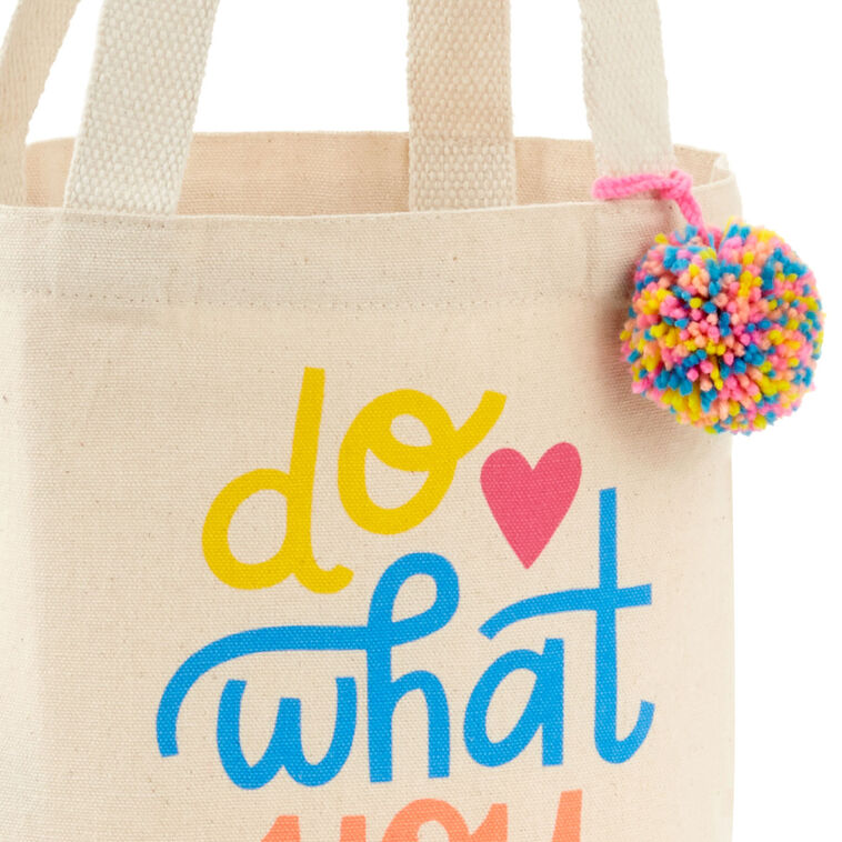 Hallmark 10.5-inch Do What You Love square fabric gift bag with retro lettering and pom-pom
