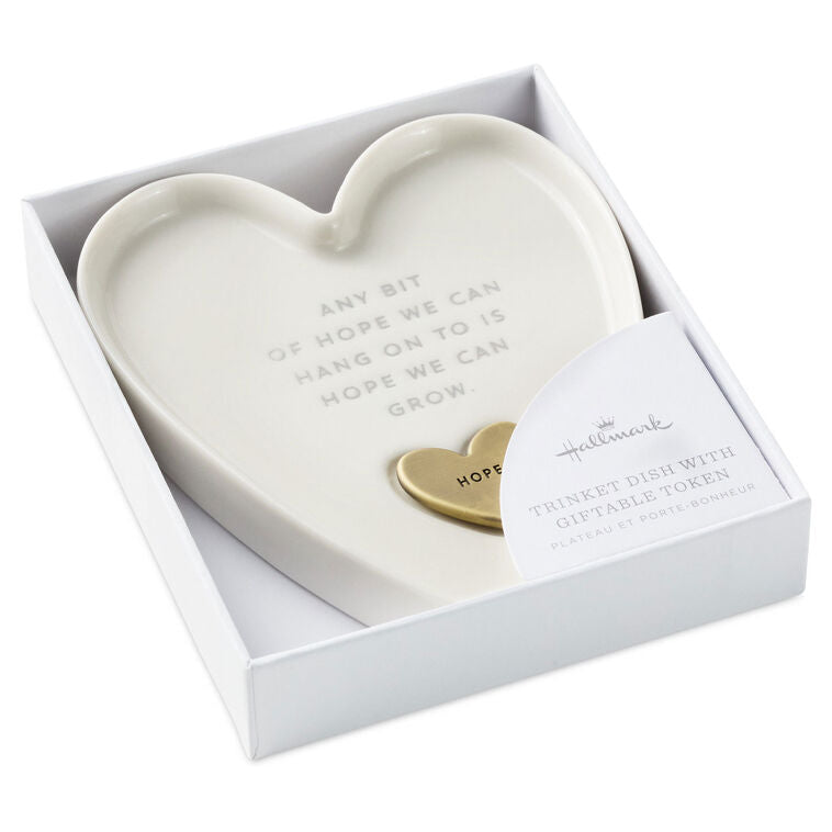 White heart-shaped Hallmark trinket dish with “Hope” engraved token and gray inspirational message.