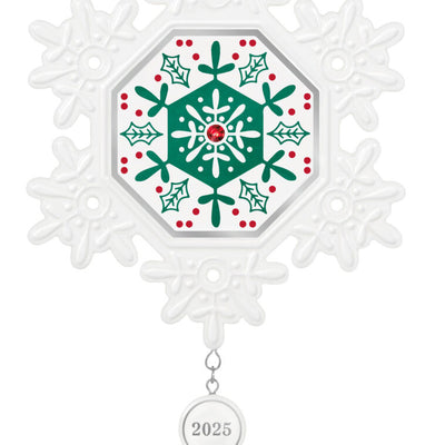 Elegant white porcelain snowflake ornament with red and green accents and red gemstone for 2025