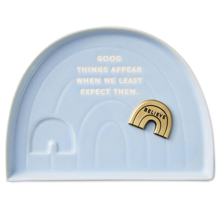 Hallmark rainbow-shaped blue ceramic trinket dish with “Believe” metal token and inspirational quote.