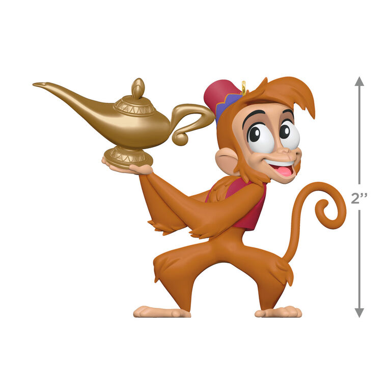 Abu the monkey from Disney’s Aladdin holding the magic lamp in a festive Christmas tree ornament
