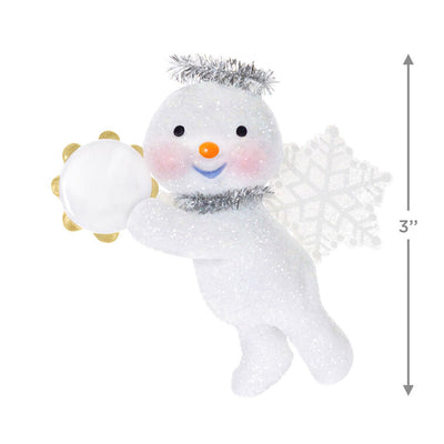 Glittery snow angel snowman ornament with tinsel halo, snowflake wings, rosy cheeks, and holding a tambourine

