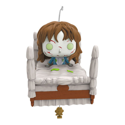 Funko POP! ornament of possessed Regan from The Exorcist in four-poster bed with spinning head motion