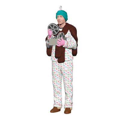 Hallmark Keepsake ornament of Clark Griswold in pajamas, fur stole, gloves, and turban holding a projector from National Lampoon's Christmas Vacation.