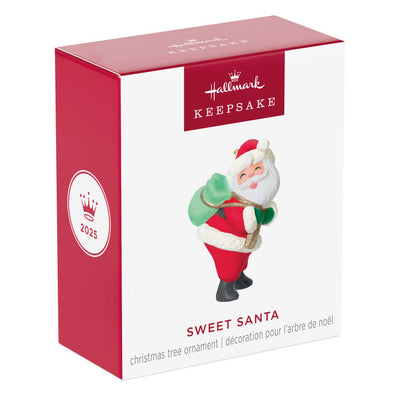Mini Santa Claus ornament with rosy cheeks and green toy sack, retro-styled Hallmark Keepsake Christmas collectible