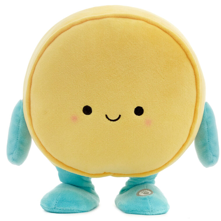 Round yellow smiley face plush toy with blue arms and legs, dancing and singing &