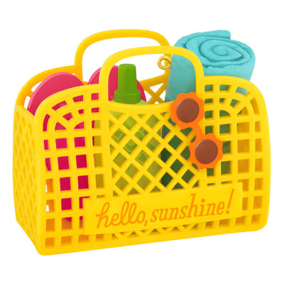 Yellow beach bag ornament with flip-flops, swim towel, sunglasses, and sunscreen, perfect for summer-themed holiday decor

