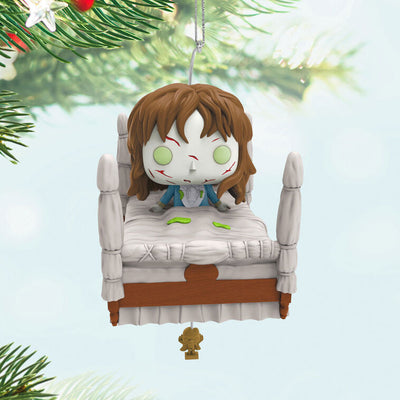 Funko POP! ornament of possessed Regan from The Exorcist in four-poster bed with spinning head motion