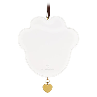 Paw-shaped pet memorial ornament with photo frame, metal heart charm dated 2025, and “In Our Hearts to Stay” collar design.