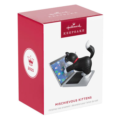 Hallmark Keepsake ornament of black-and-white tuxedo kitten playing with laptop showing colorful fish, Mischievous Kittens series