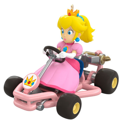 Princess Peach from Mario Kart drives a pink go-kart, wheels turning, Hallmark Keepsake Christmas ornament inspired by the Nintendo video game.