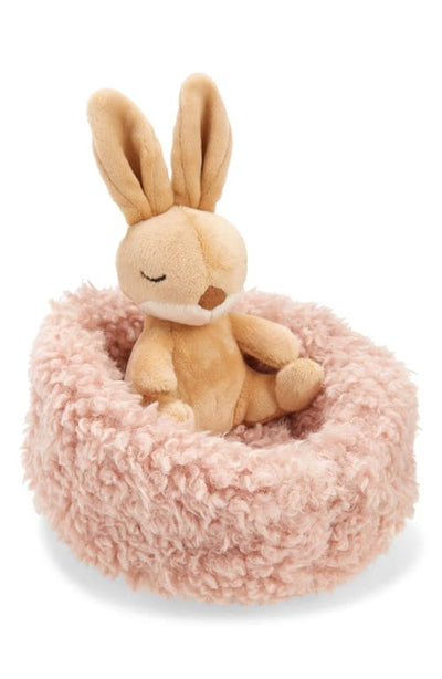 Stuffed rabbit in pink nest by Jellycat Hibernating Bunny