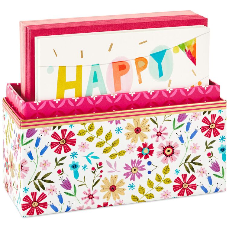 Assorted whimsical note cards with gold foil accents in multiple designs, includes envelopes and reusable caddy.