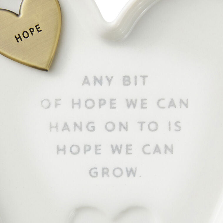 White heart-shaped Hallmark trinket dish with “Hope” engraved token and gray inspirational message.