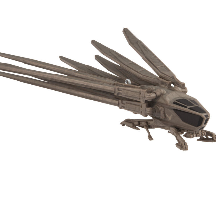Die-cast Dune ornament of Atreides ornithopter aircraft with folding wings and bird-like shape.