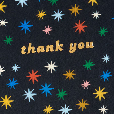 Black thank you cards with multicolor stars and gold foil lettering, shown in a kraft box with white envelopes, pack of 10
