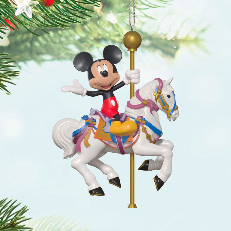 Hallmark Keepsake Disneyland King Arthur Carrousel ornament featuring Mickey Mouse riding a white carousel horse with gold pole, colorful saddle.