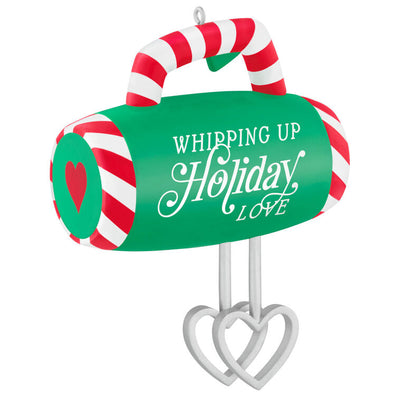 Green hand-mixer Christmas ornament with candy cane stripes and heart-shaped beaters, festive holiday kitchen decor

