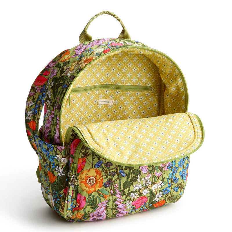Vera Bradley Small Banbury Backpack in Meadow Bouquet with floral print, multiple zip compartments, and adjustable straps for hands-free convenience.